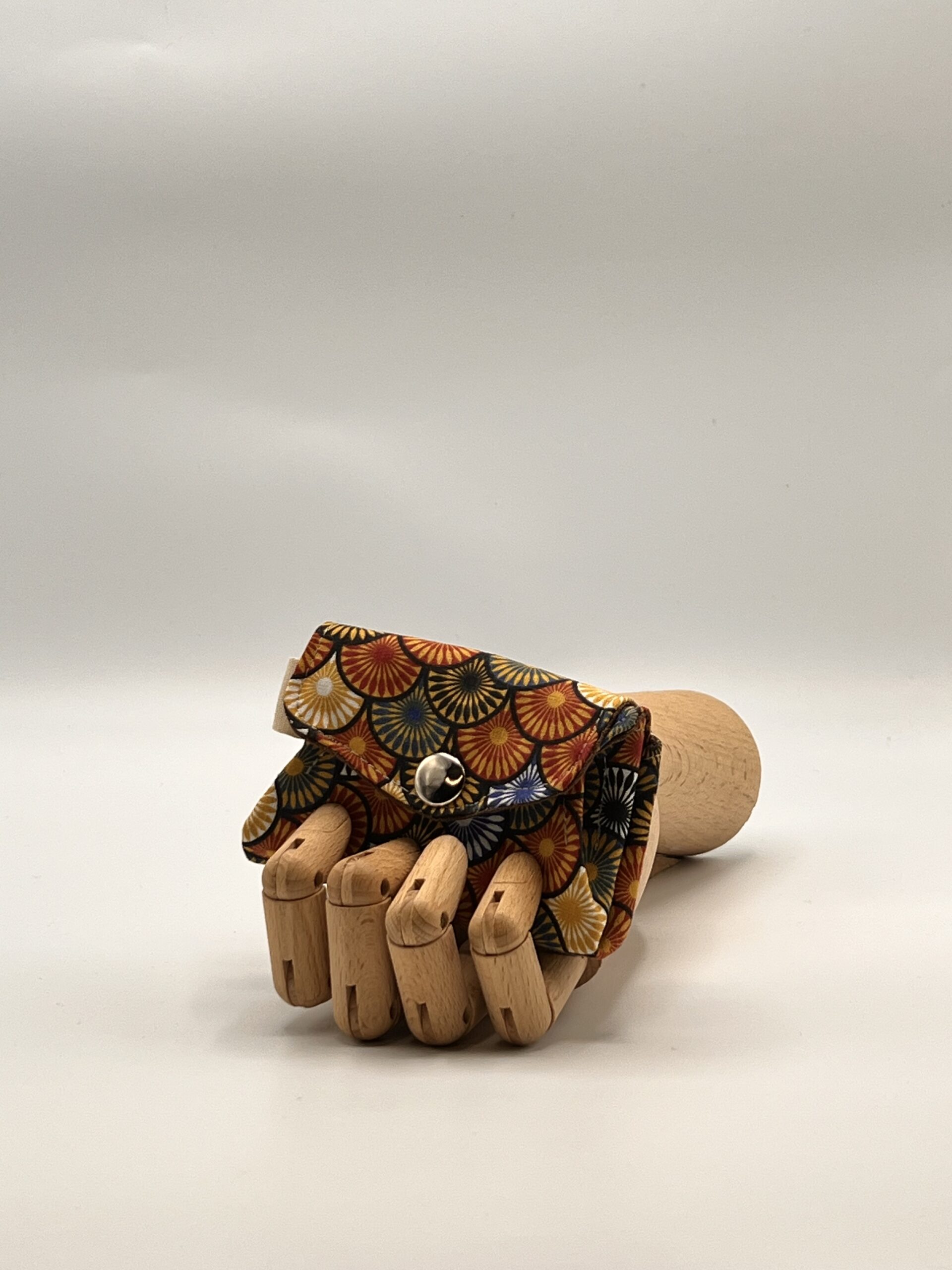 Monedero APONI-abanicos naranjas.