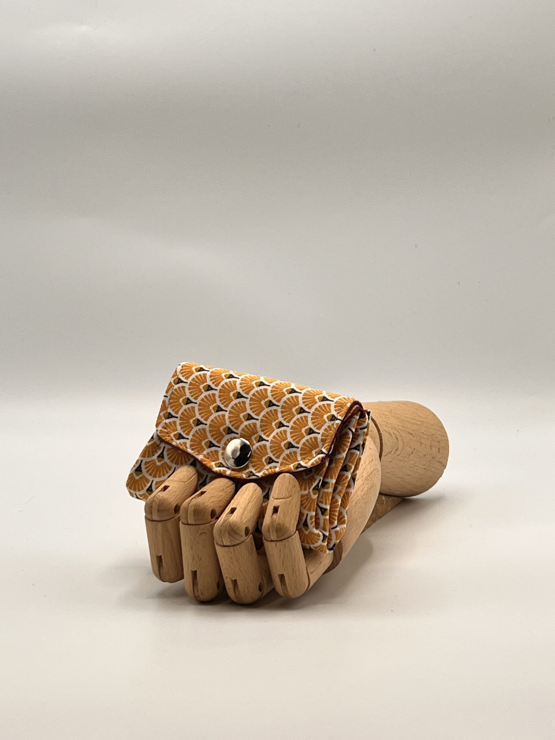 Monedero APONI-geométrico naranja.