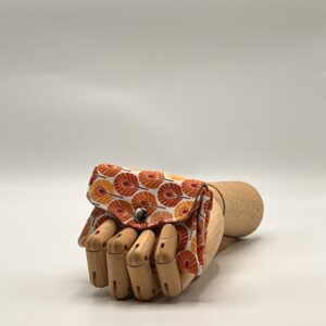 Monedero APONI-pluma naranja.