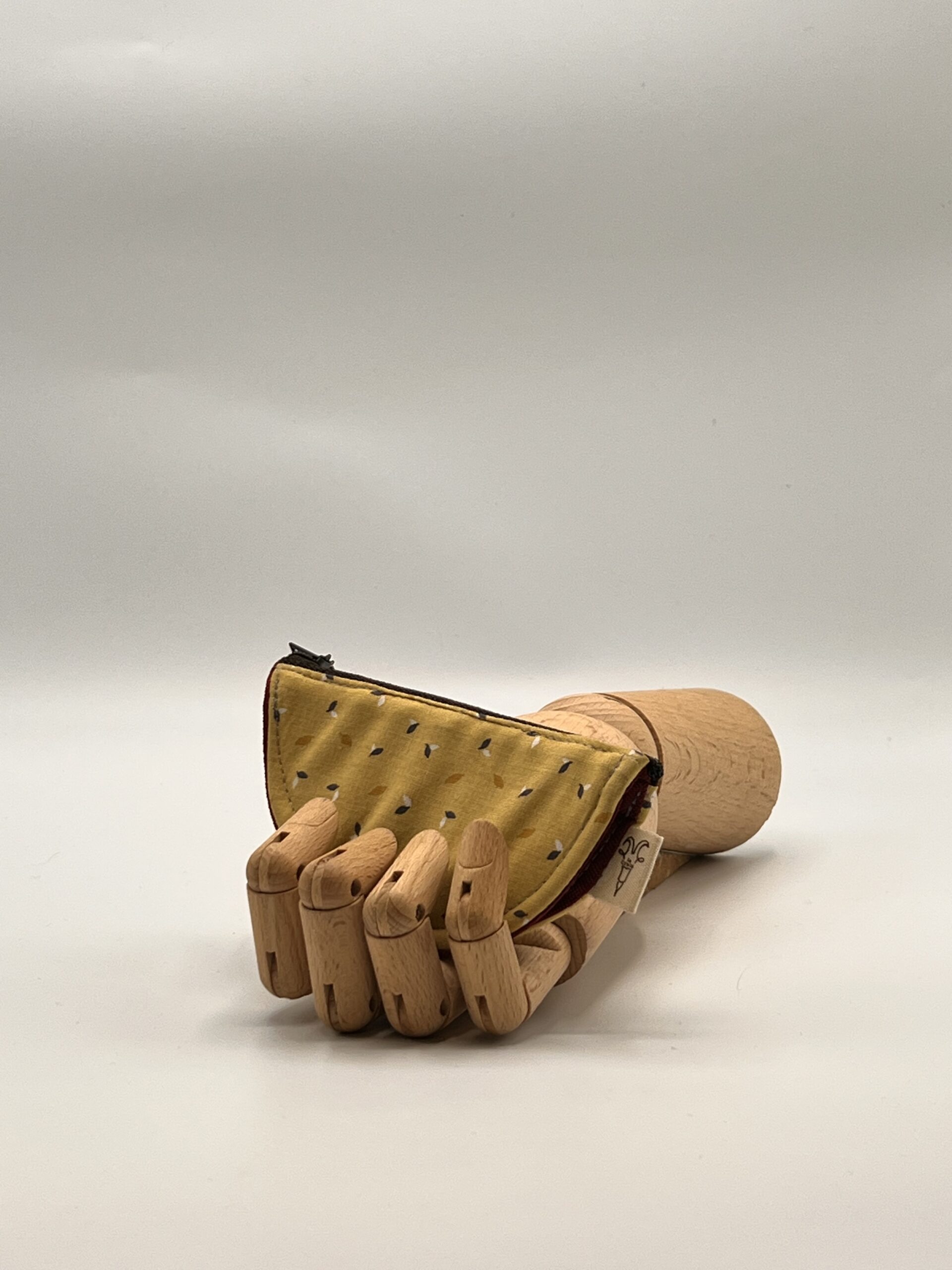 Monedero LIRA-hojitas.