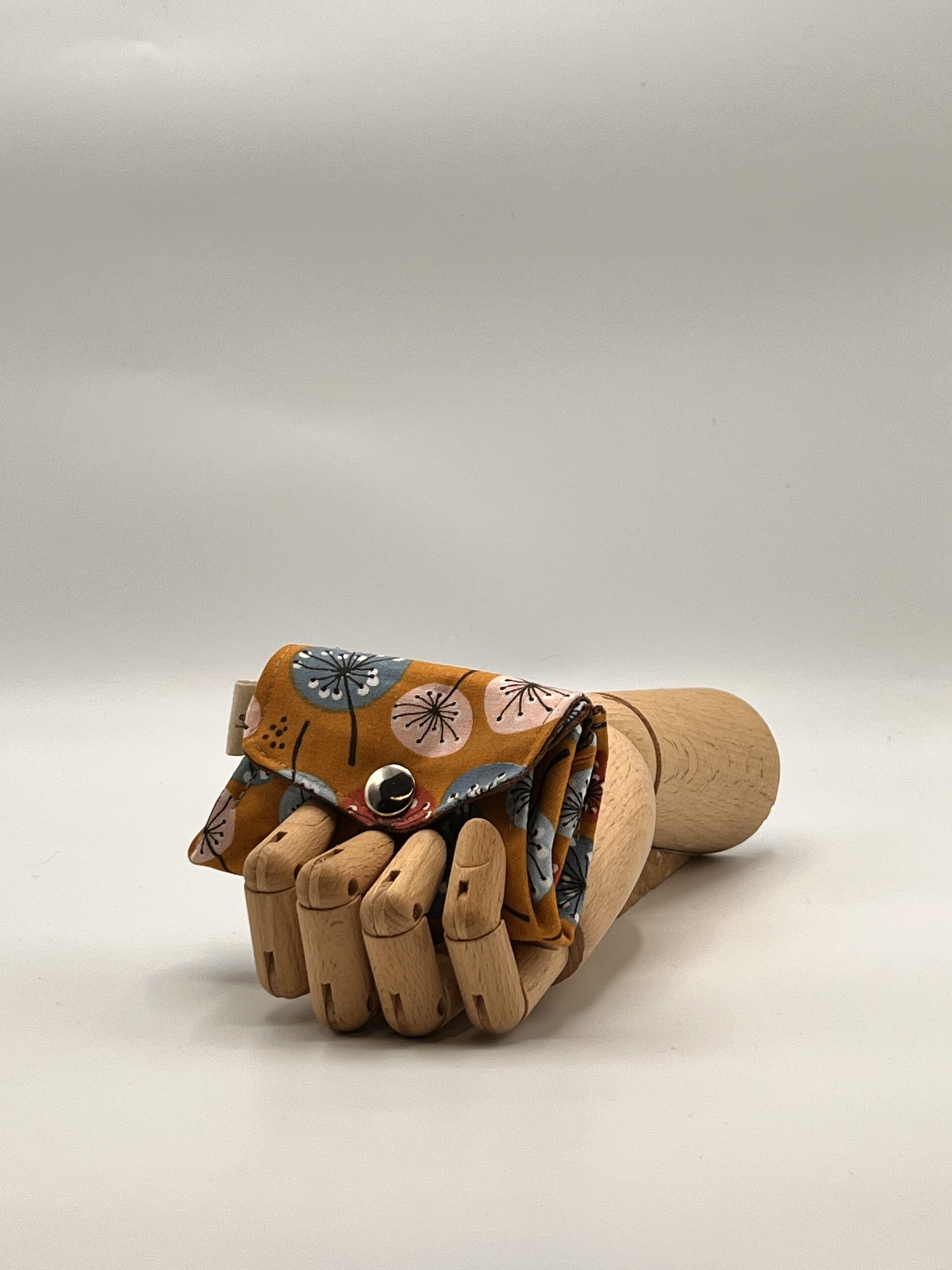 Monedero APONI-diente de león mostaza.