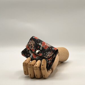 Monedero APONI-catrinas rosas.