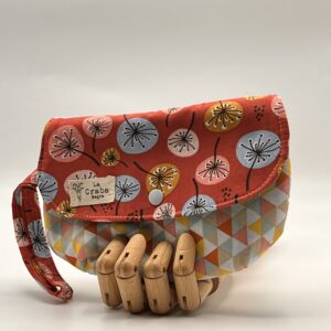 Neceser MIKA-diente de león rojo.