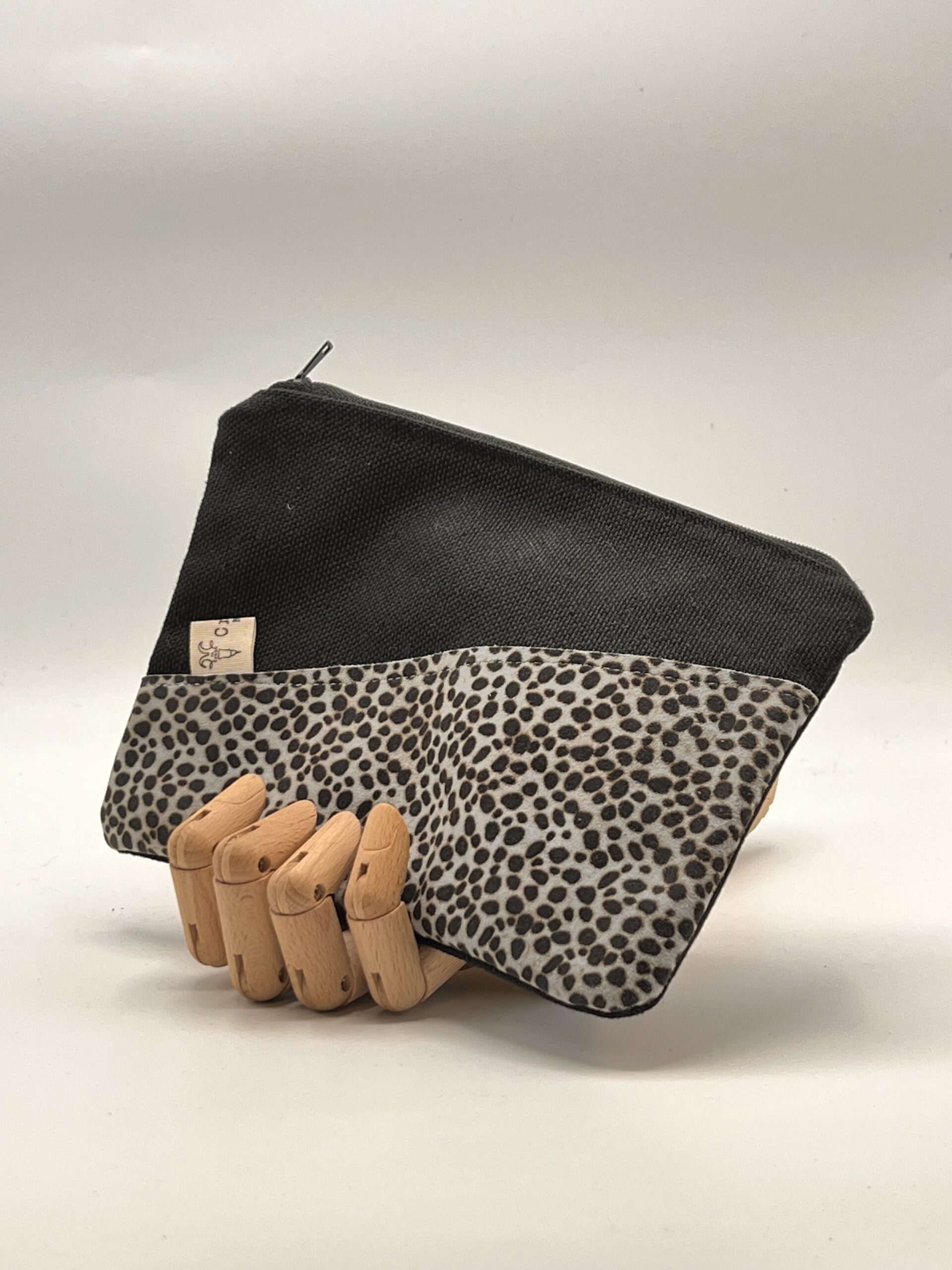 MONEDERO-NECESER-TIERRAU. Negro topo azul.